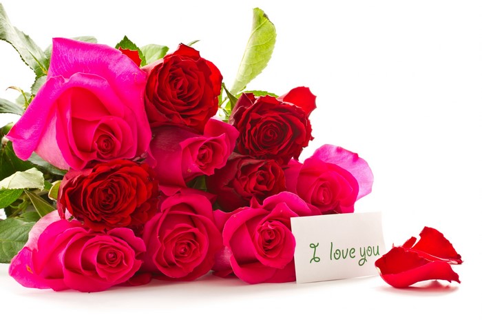 Bouquet of red and pink roses with a card