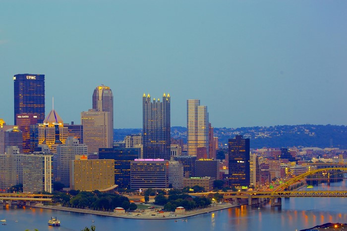 Pittsburgh skyline with bridges over the river at dusk