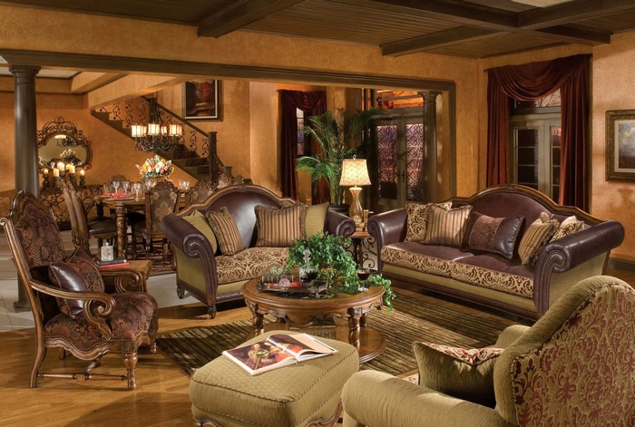 Luxurious living room with ornate furniture and dining area