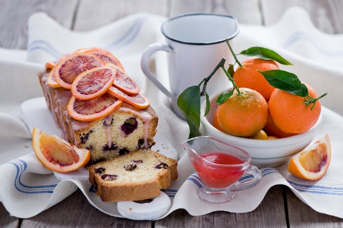 Orange pound cake with blood orange slices and mandarins