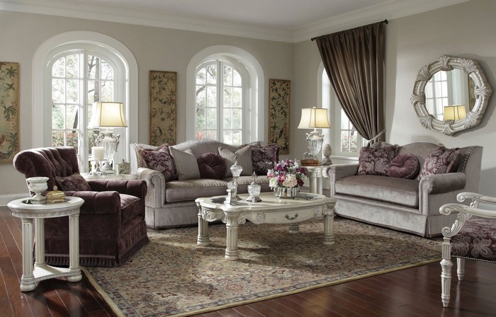 Elegant living room with plush furniture and ornate decor