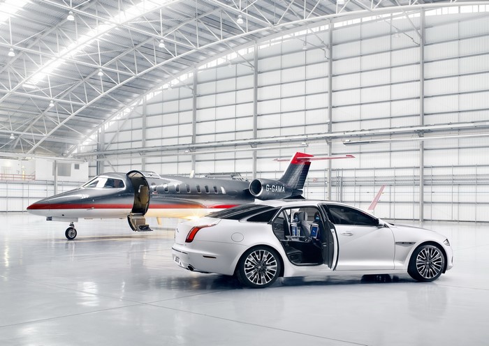 Jaguar XJ Ultimate and private jet in hangar