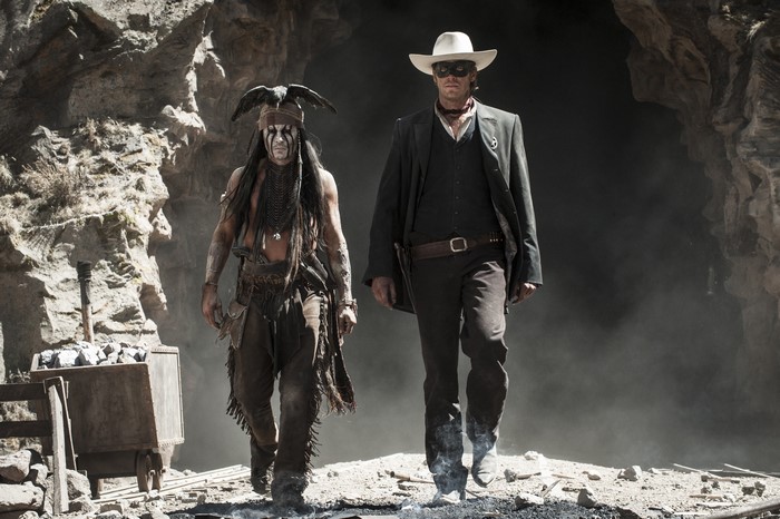 The Lone Ranger and Tonto walking in a canyon