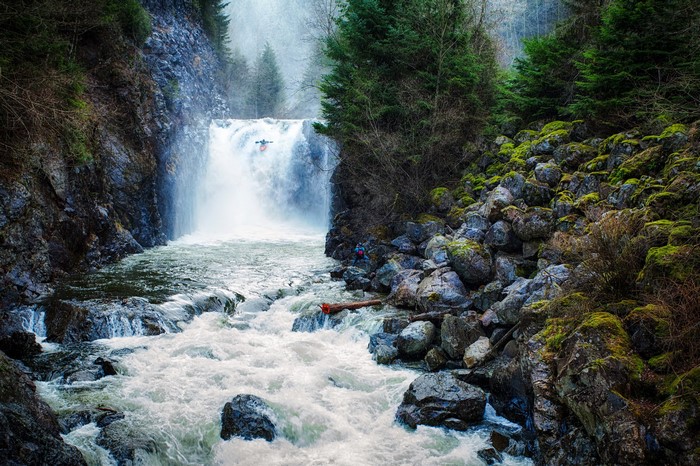 Kayaker goes over a waterfall in Washington