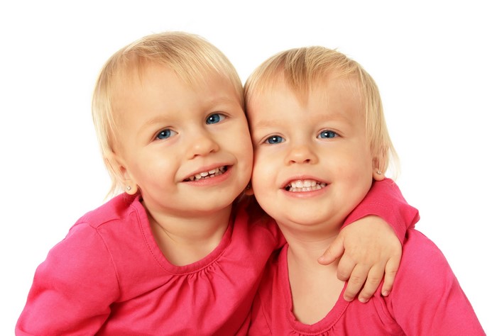 Two little girls in pink