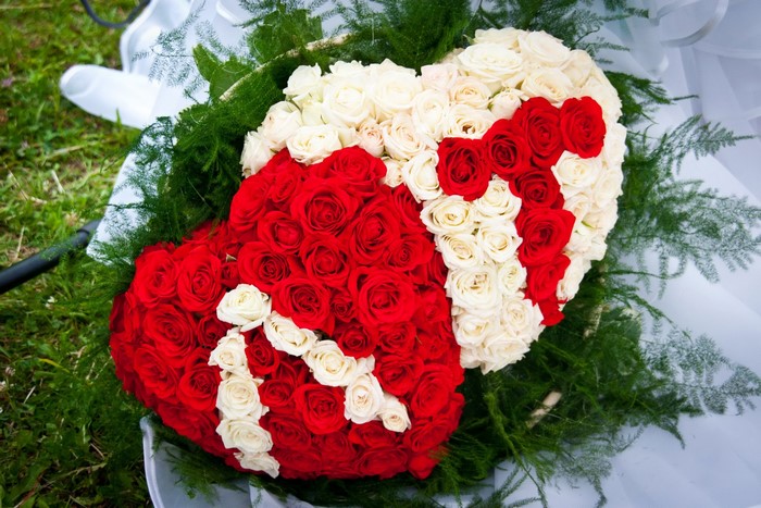 Two heart-shaped rose arrangements