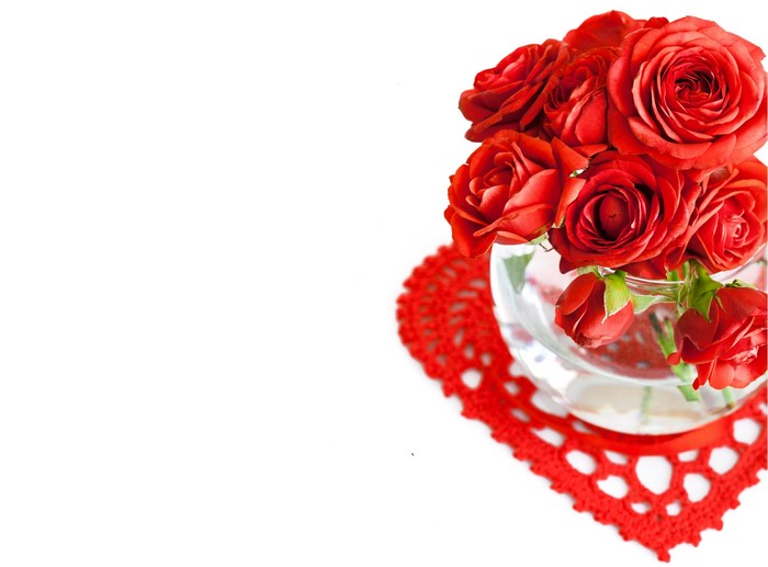 Red Roses in a Glass Vase on a Red Doily