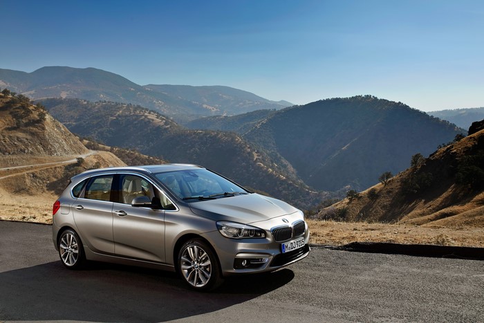 Silver BMW 224i Active Tourer on a mountain road