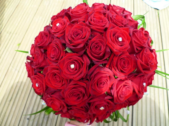 Bouquet of red roses with diamonds