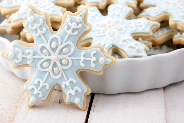 Blue snowflake cookies with white icing