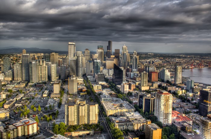 Seattle, Washington cityscape from above under cloudy skies