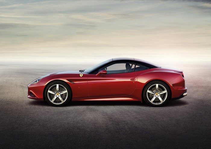 Red Ferrari California T parked on asphalt