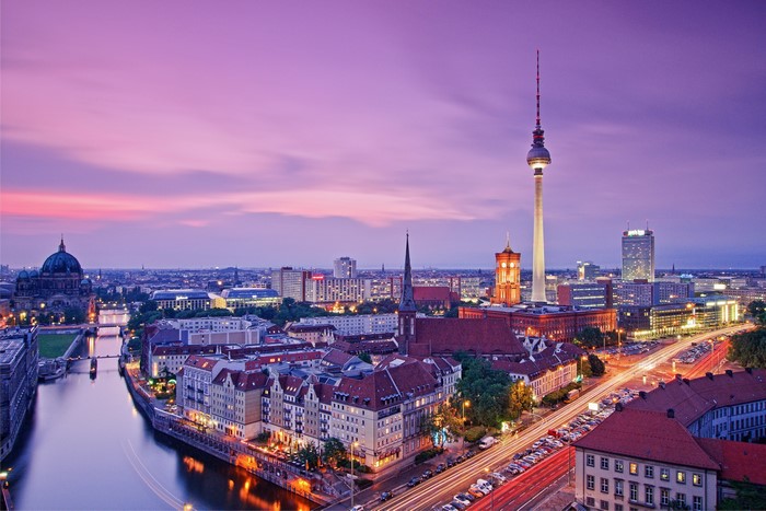 Berlin cityscape with TV Tower and Spree River at dusk
