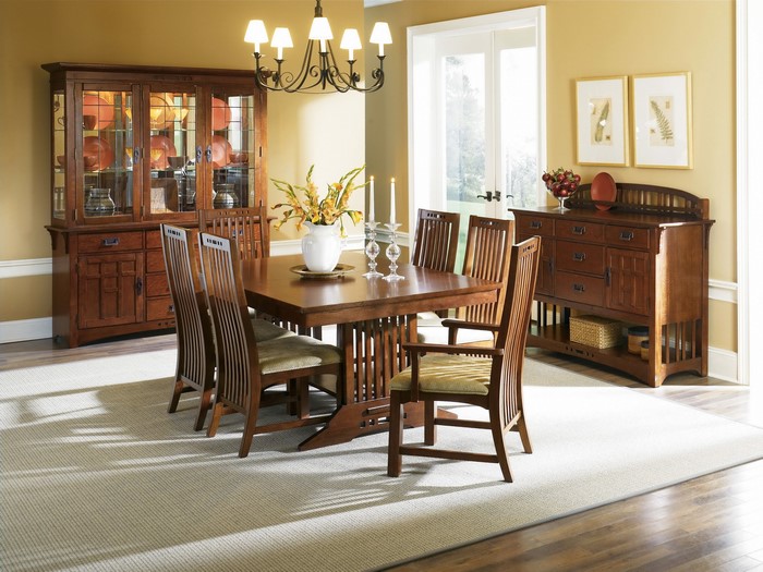 Dining room with wooden furniture and chandelier