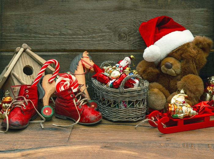 Christmas teddy bear with Santa hat and vintage toys