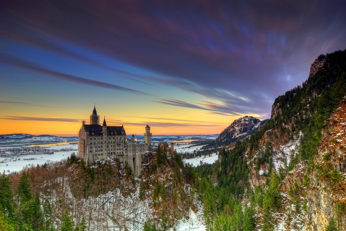 Neuschwanstein Castle in Germany during winter at sunset