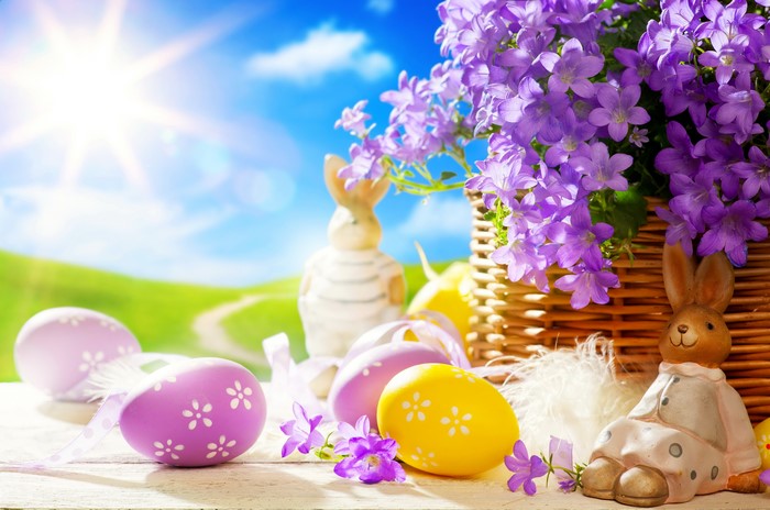 Easter Eggs and Flowers in a Wicker Basket