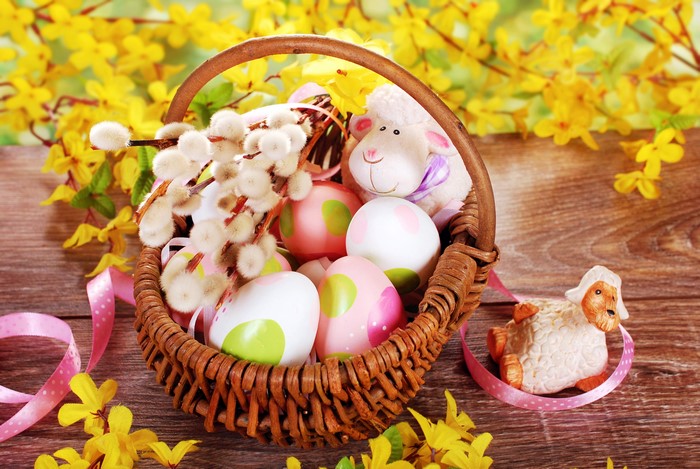 Easter basket with eggs and sheep decorations