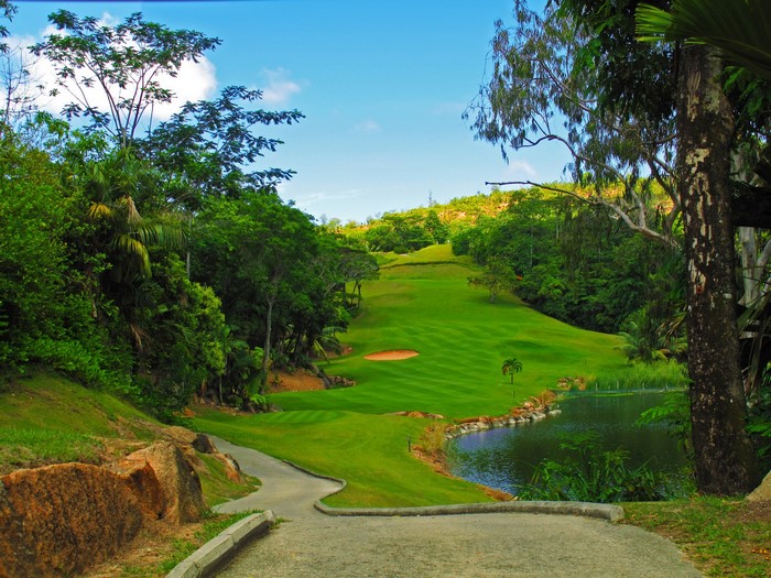 Golf course with pond and trees in Praslin, Seychelles