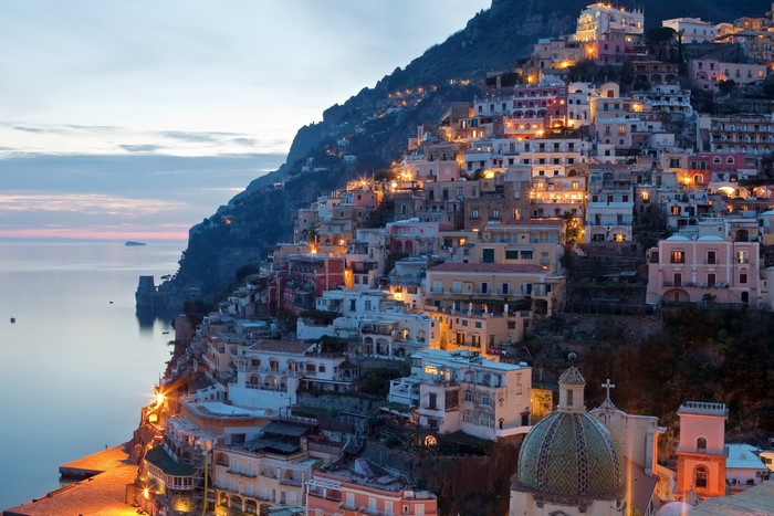 Positano, Italy cliffside village at dusk