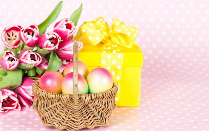 Easter basket with tulips and gift