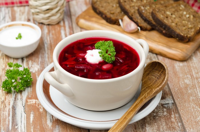Borscht soup with sour cream and bread