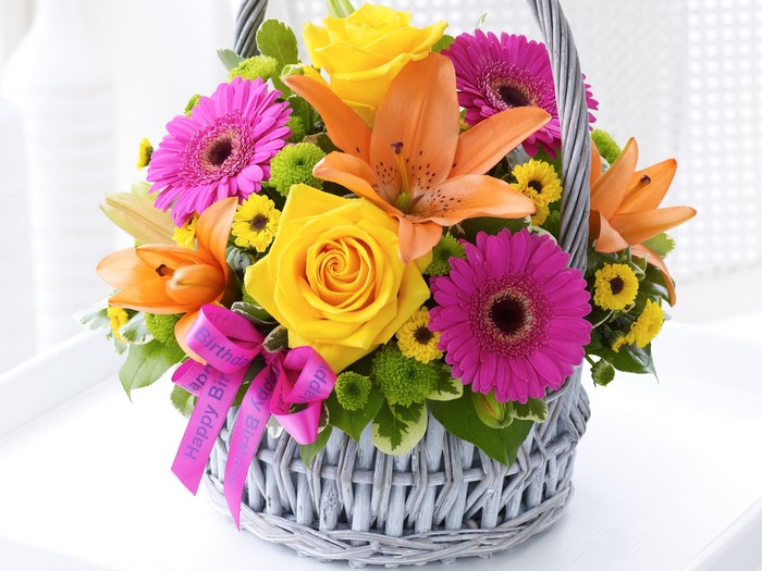 Birthday flower basket with roses, lilies, and gerberas