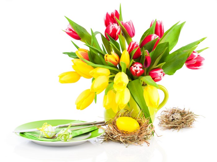 Easter tulips and place setting with eggs