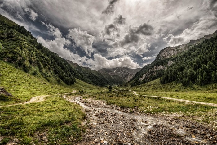 Mountain valley with stream and trails in Tyrol, Austria