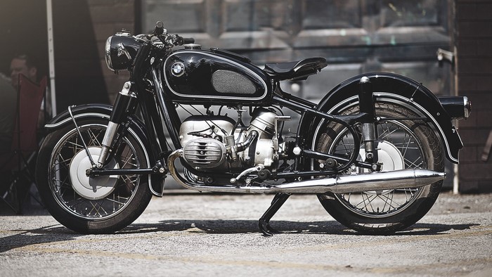 Black vintage BMW motorcycle parked outdoors