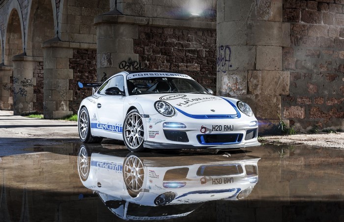 White Porsche 911 Turbo with racing decals