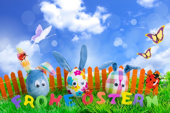Easter bunnies and butterflies on a sunny day