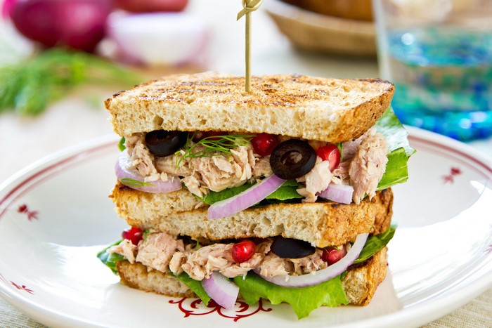 Tuna sandwich with olives and pomegranate