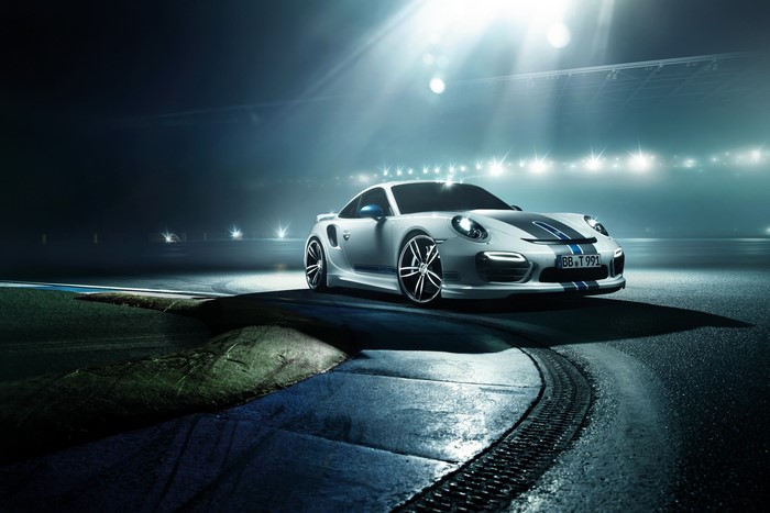 White Porsche 911 Turbo (TechArt) on a Racetrack at Night