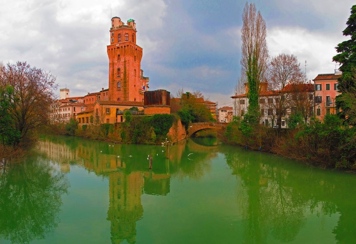 Torre della Specola and river in Padova, Italy