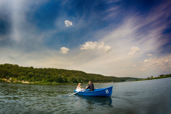 Bride and Groom in a Boat on a Lake
