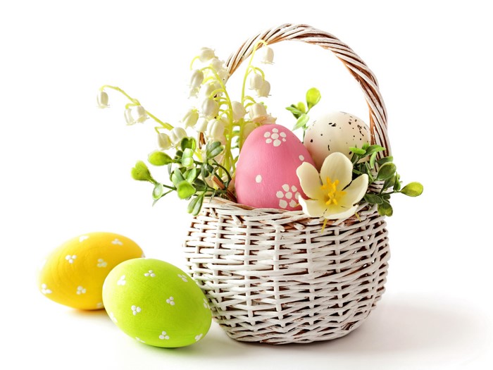 Easter Wicker Basket with Eggs and Lilies of the Valley