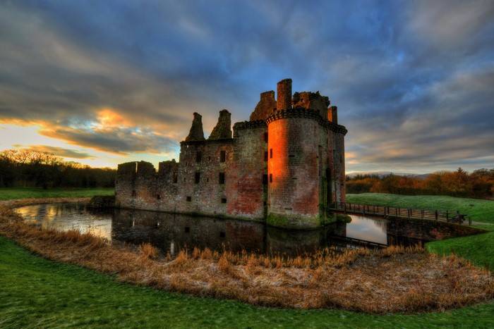 Caerlaverock Castle in Scotland at sunset