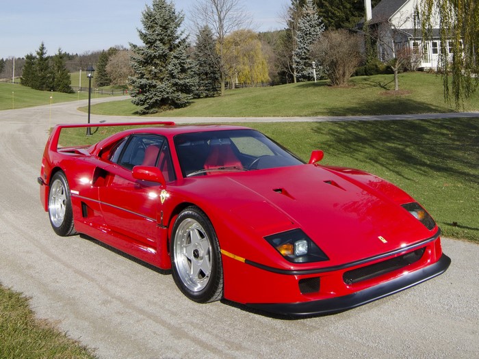 Red 1987 Ferrari F40 on a Road