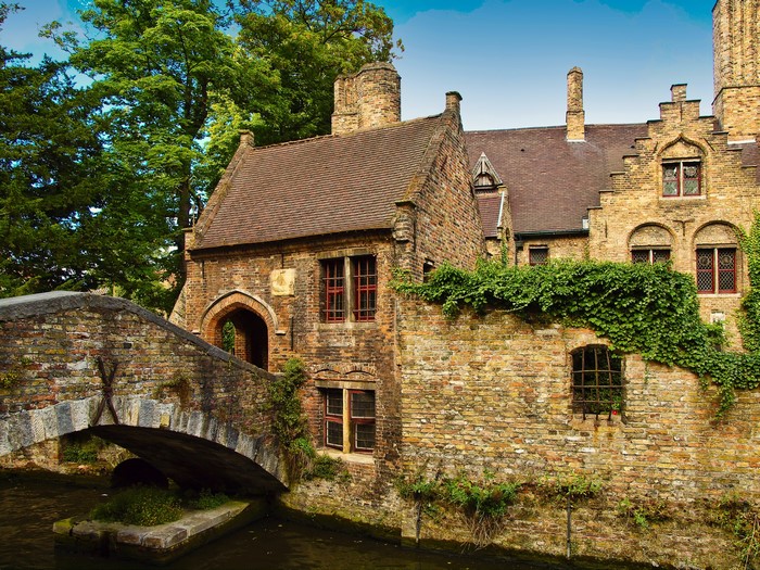 Brick bridge and houses in Bruges, Belgium
