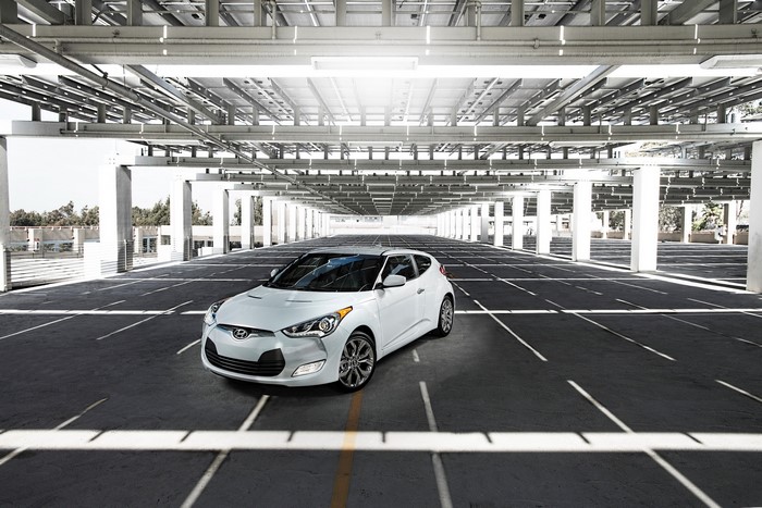 White 2014 Hyundai Veloster RE-FLEX in parking structure