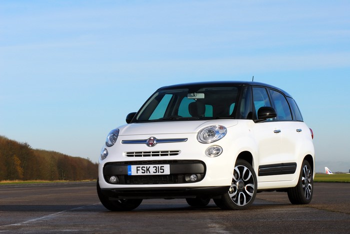 White Fiat 500L parked on asphalt