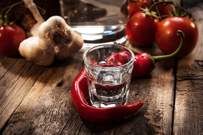 Vodka shot with chili, garlic, and tomatoes