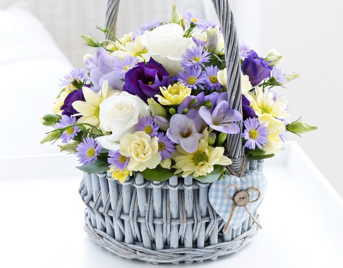 Flower basket with roses, eustoma, and chrysanthemums