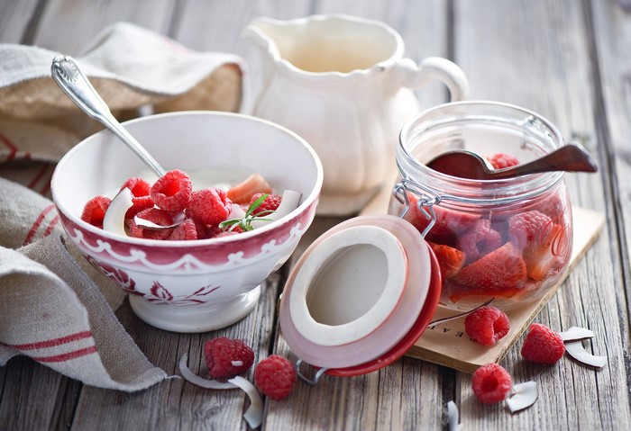 Still life with raspberries, strawberries, and coconut
