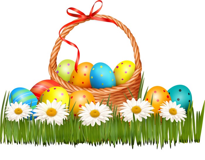 Easter eggs in a basket with daisies and grass