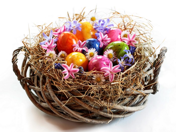 Easter Eggs and Flowers in Wicker Basket