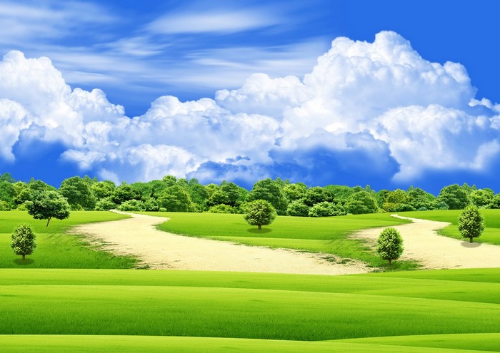 Green rolling hills with trees and clouds