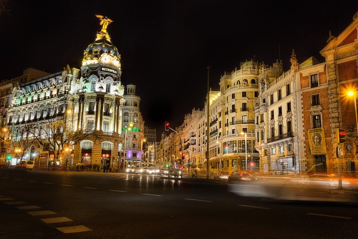Metropolis Building at Night in Madrid, Spain