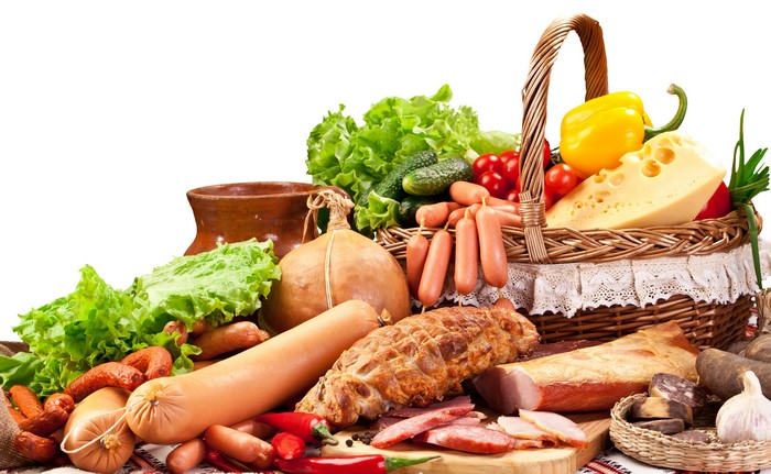 Still-life of meat products, cheese, and vegetables
